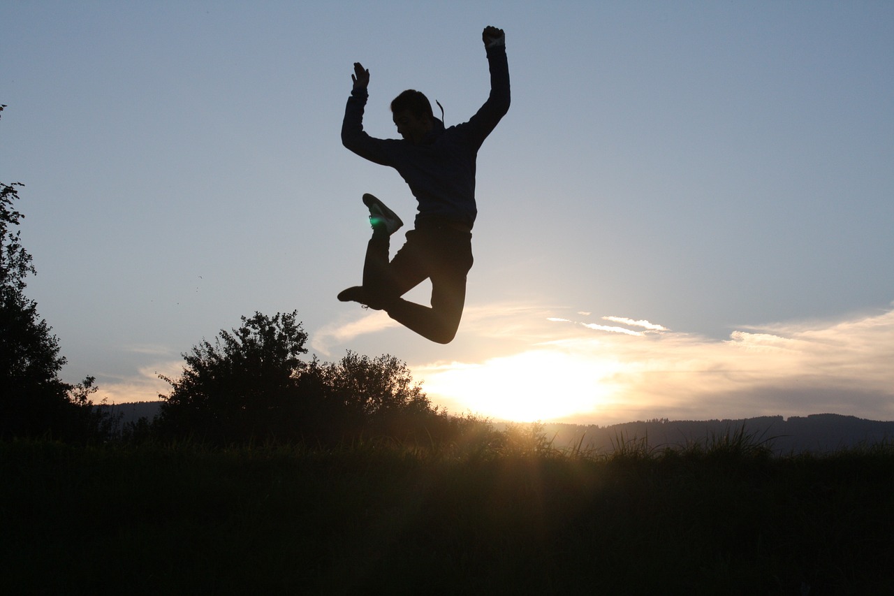 sunset jump fun free photo