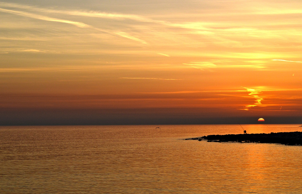 sunset fisherman fishing free photo