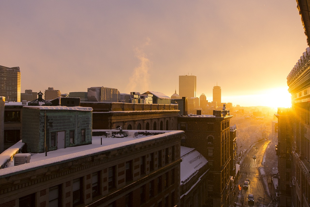 sunset cityscape golden sky free photo