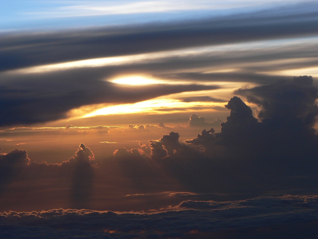 sunset above the clouds fly free photo