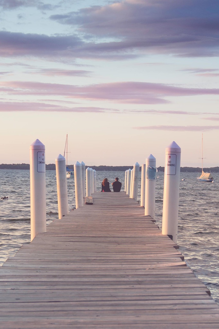 sunset couple water free photo