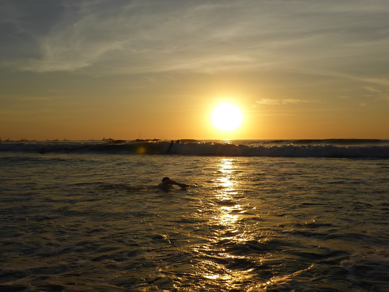 sunset surfers tamarindo free photo