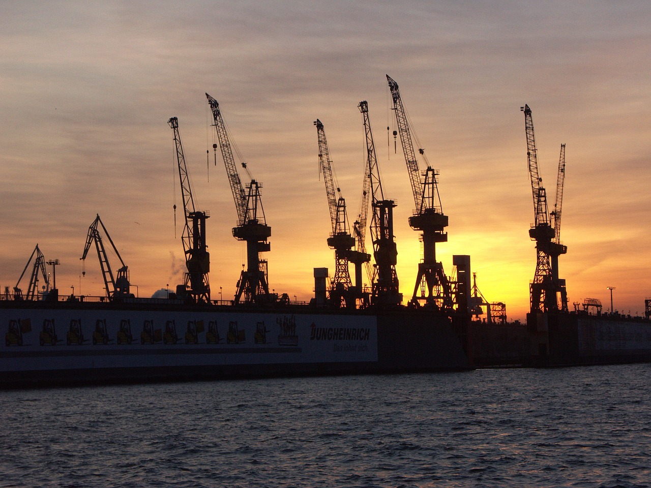 sunset hamburg shipyard free photo