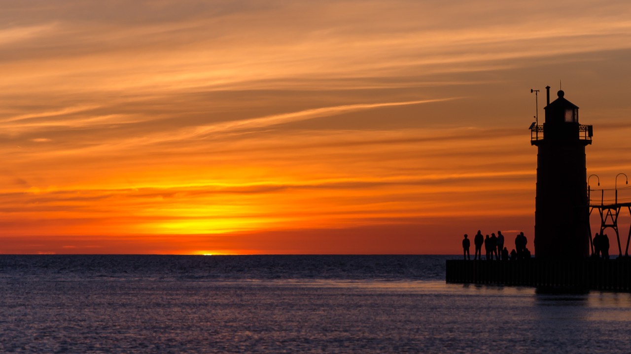 sunset lighthouse michigan free photo