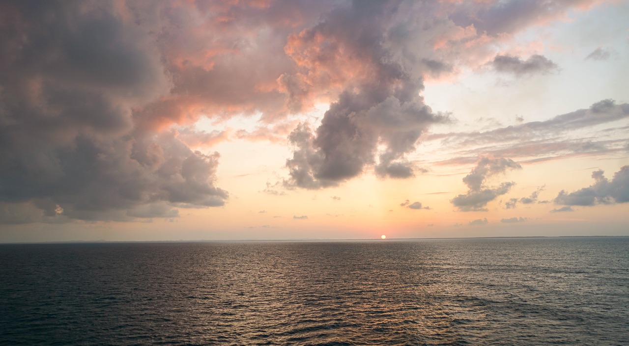 sunset sea clouds free photo