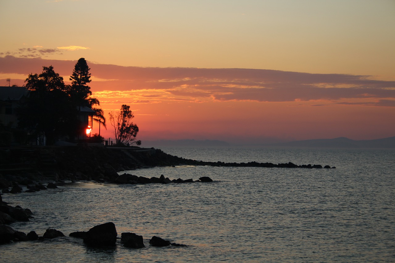 sunset silhouette shore free photo