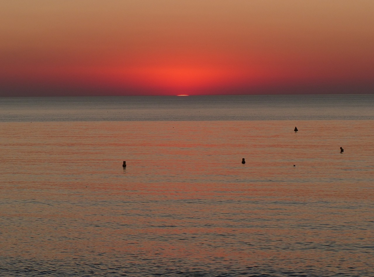 sunset sea clouds free photo