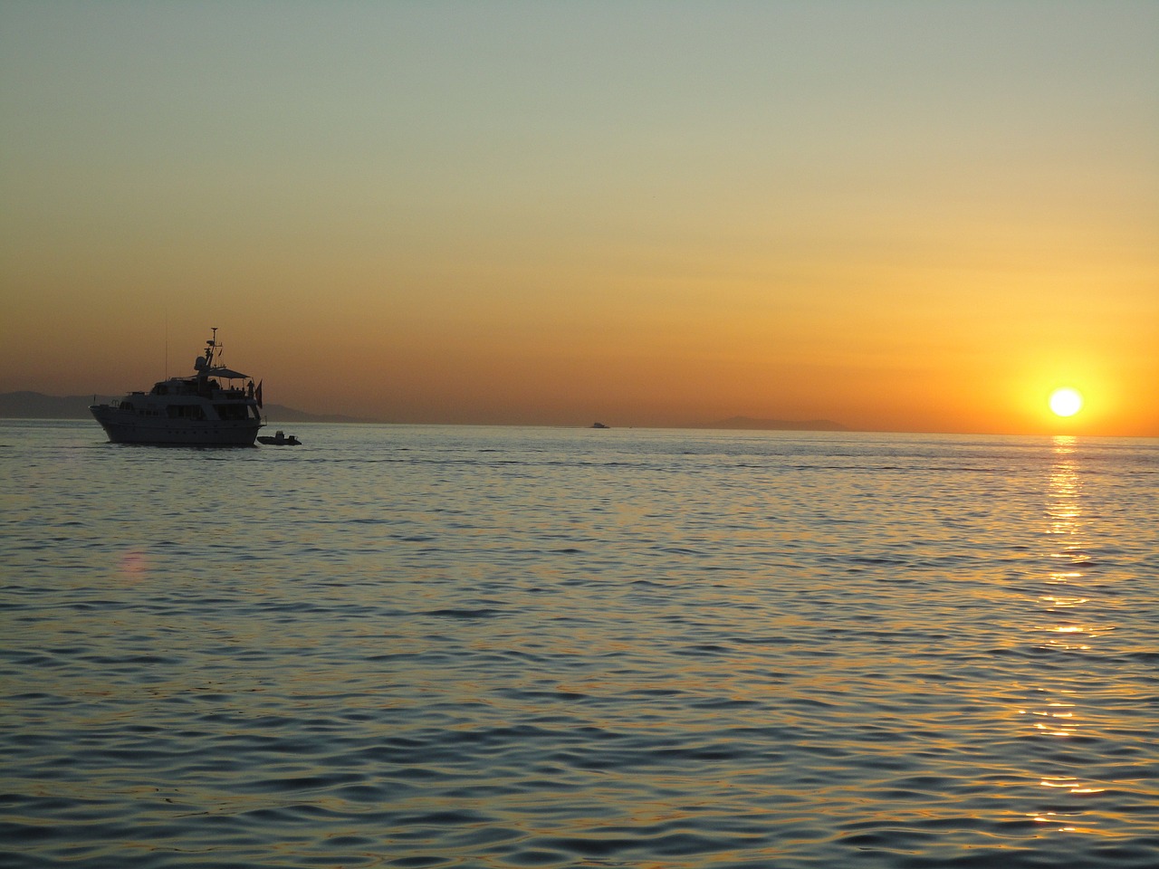 boat sunset mikonos free photo