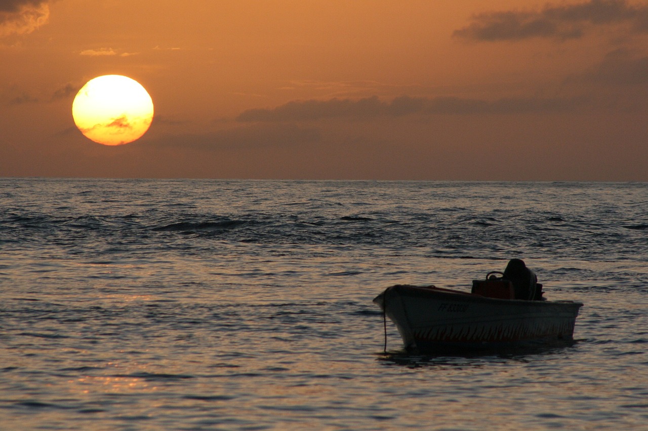 sunset boat sea free photo