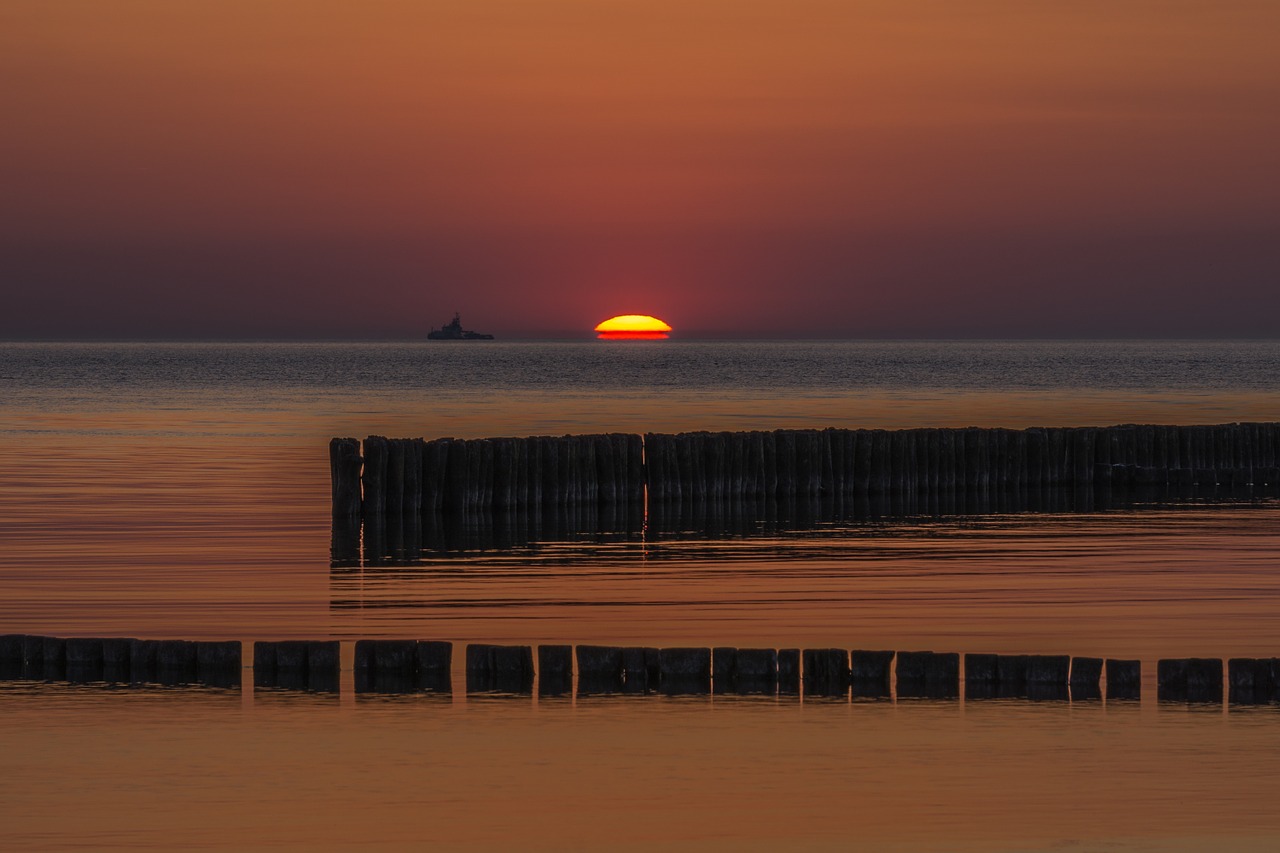 sunset beach groynes free photo