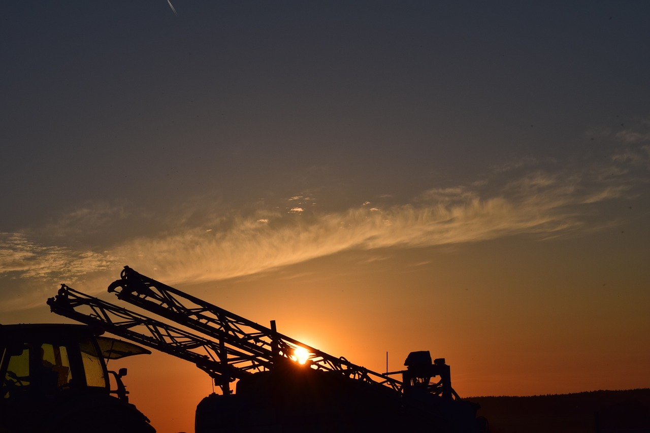 sunset agricultural machinery back light free photo