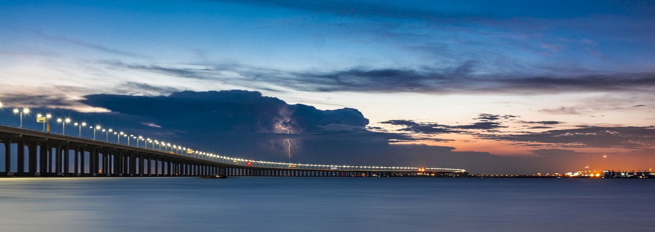 sunset bridge sea view free photo