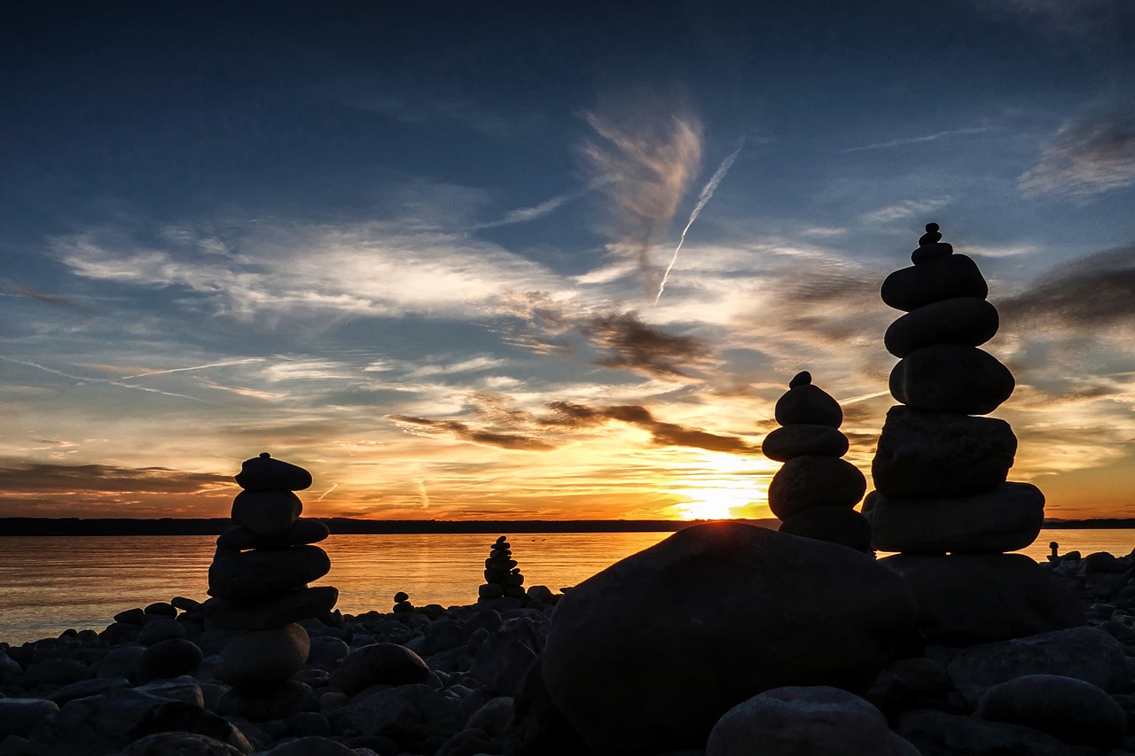 sunset stones stacked stones free photo