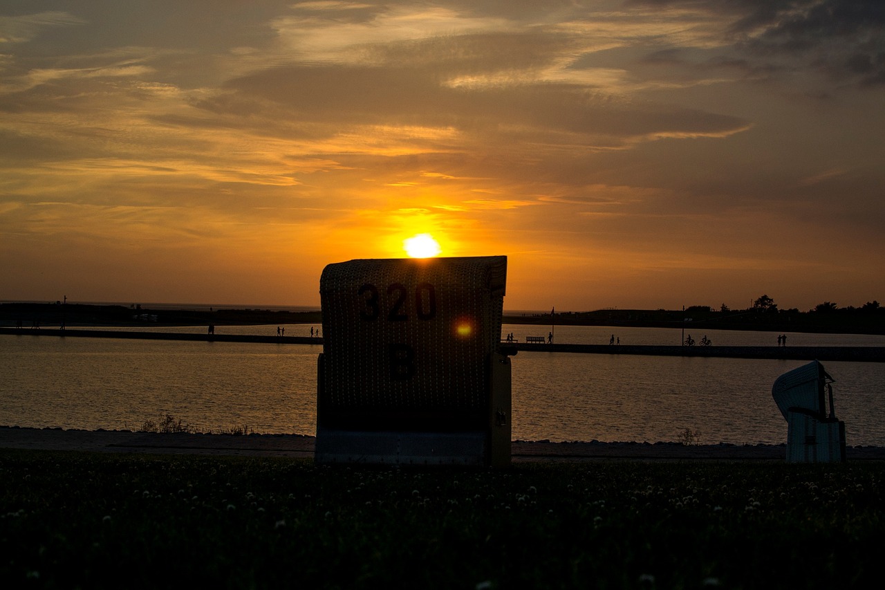 sunset beach chair north sea free photo