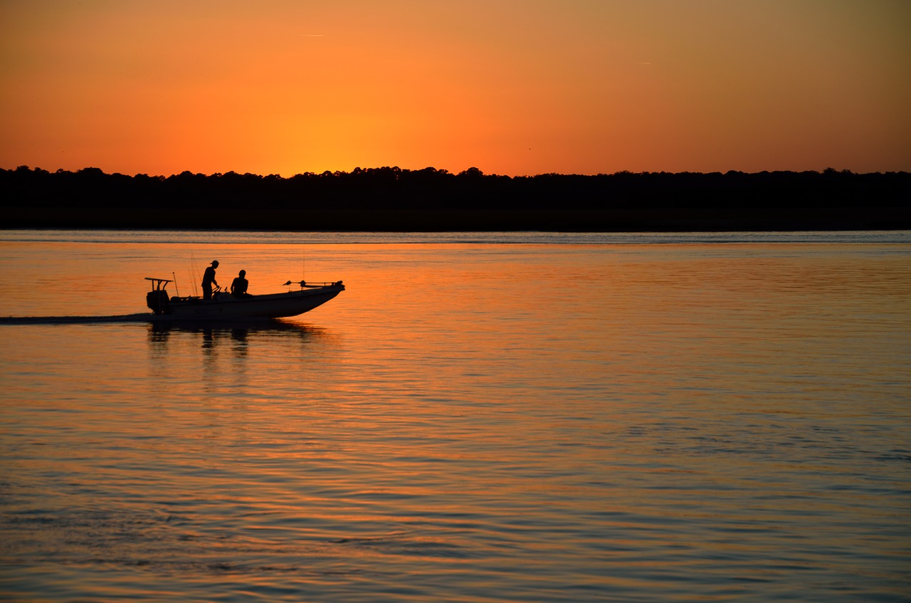 sunset silhouette boat free photo