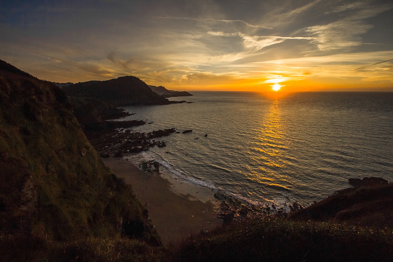 sunset sea rocks free photo