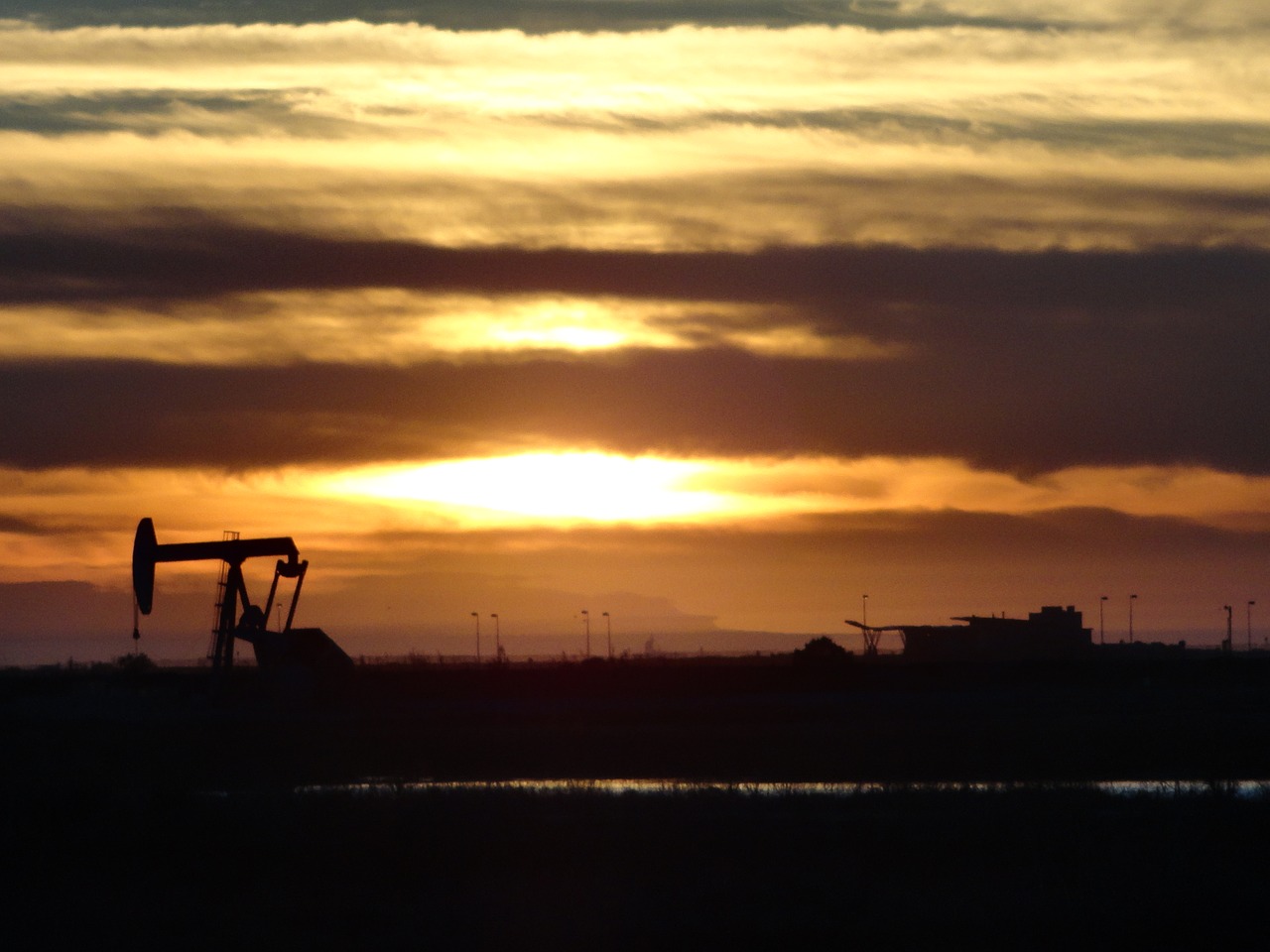 sunset huntington beach oil rig free photo