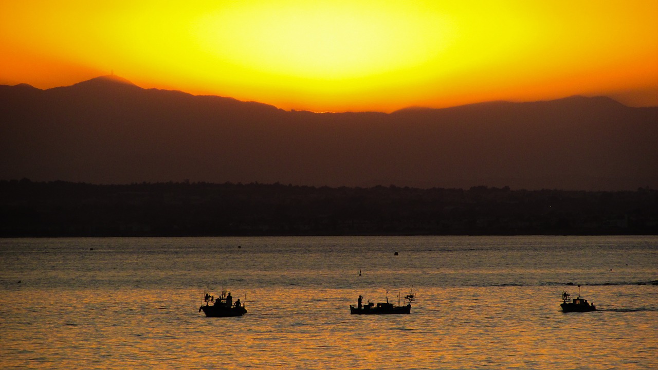 sunset sea boats free photo