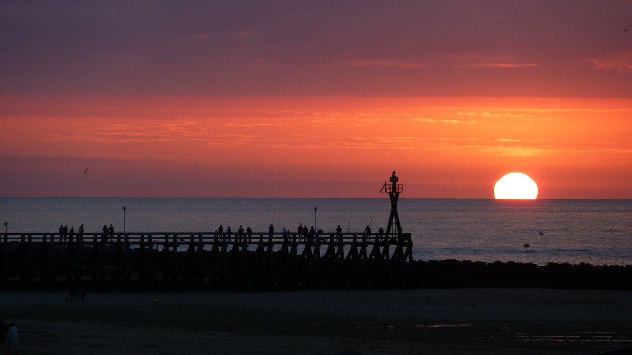 sunset pier sea free photo