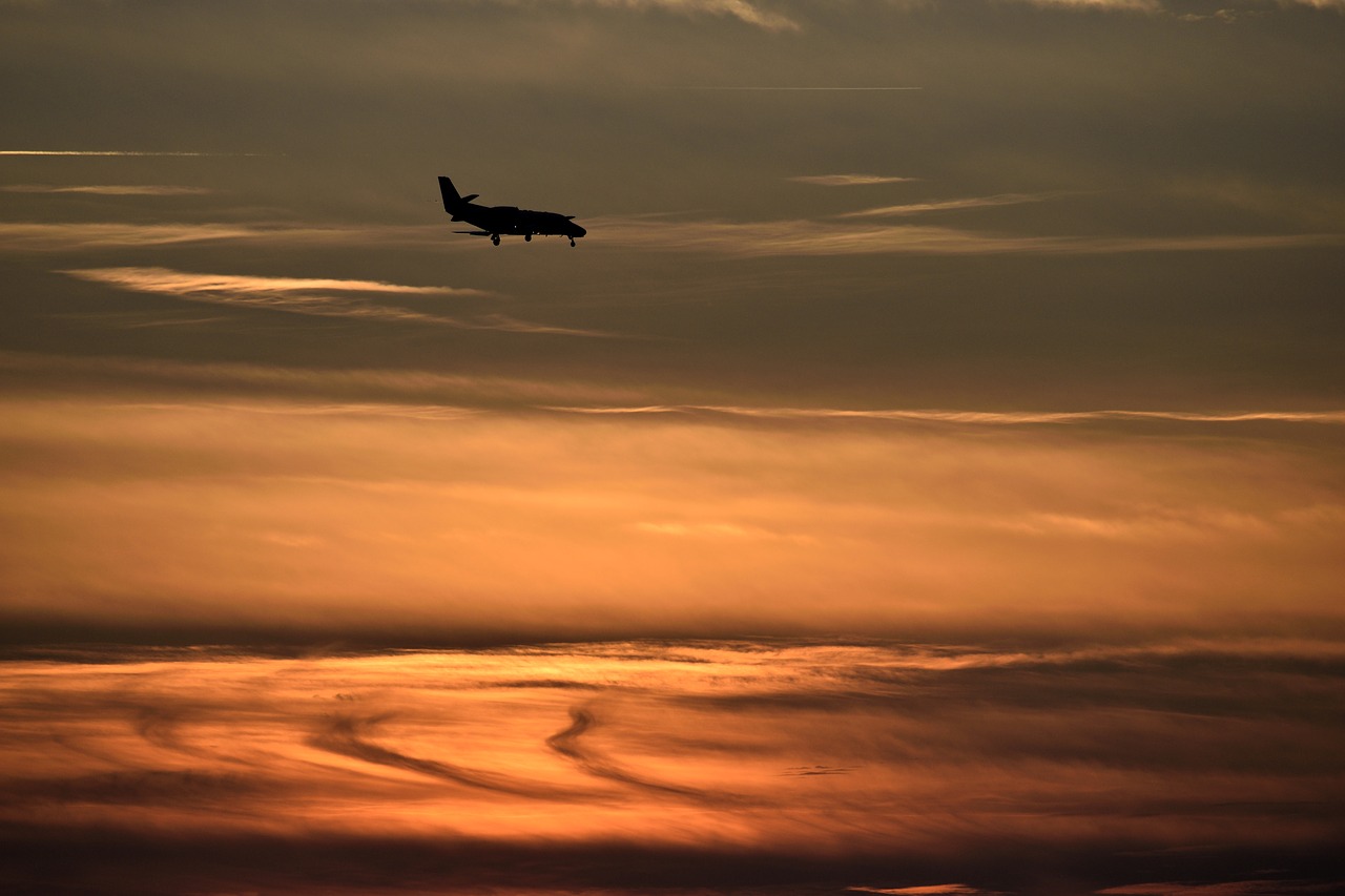 sunset orange sky airplane free photo