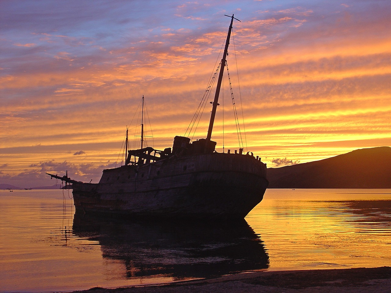 sunset shipwreck shoal free photo