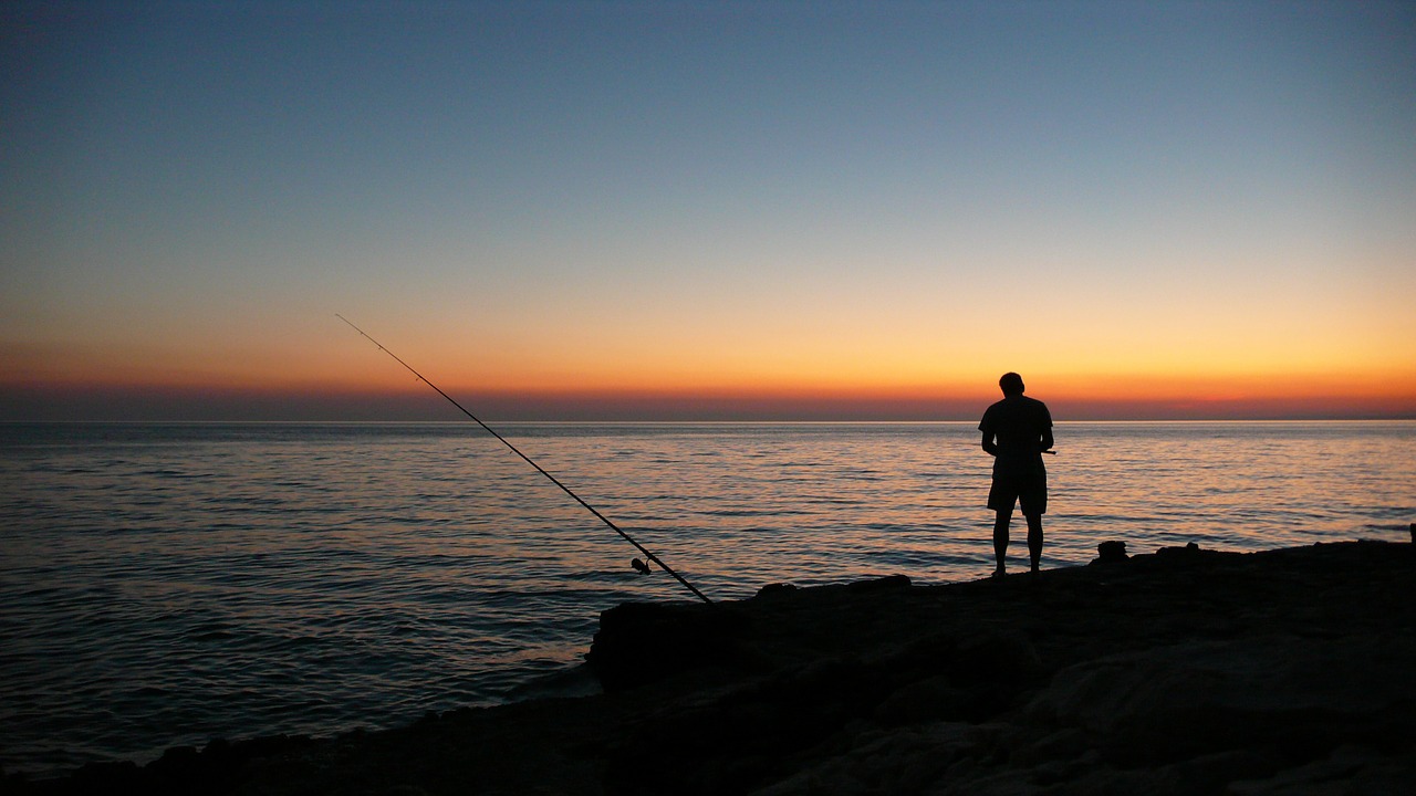 sunset sea angler free photo