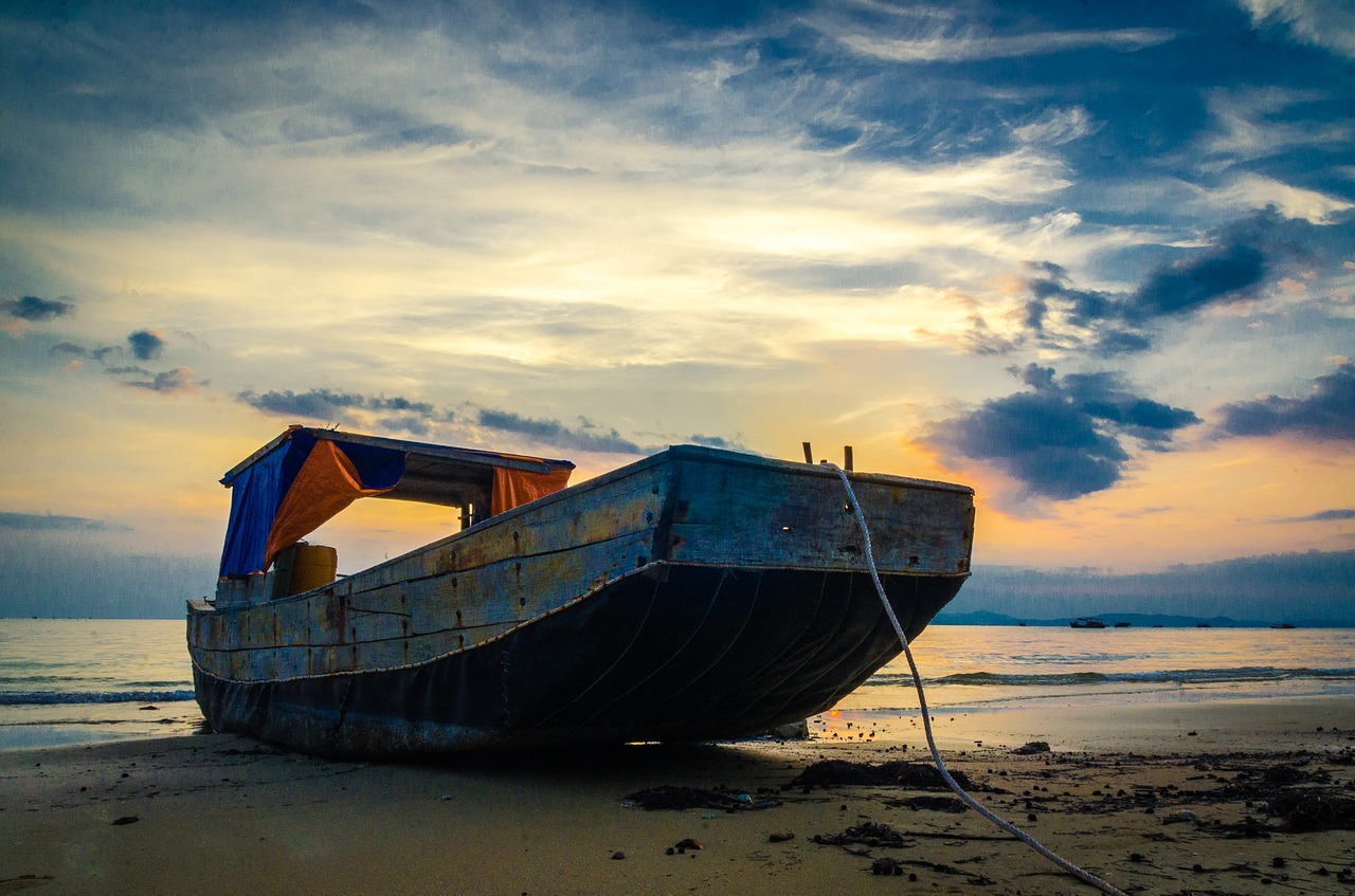 sunset the boat the sea free photo