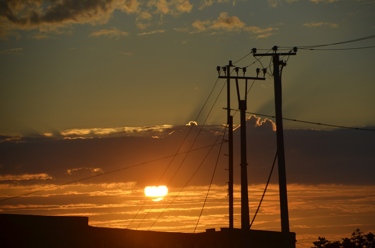 sunset masts power poles free photo