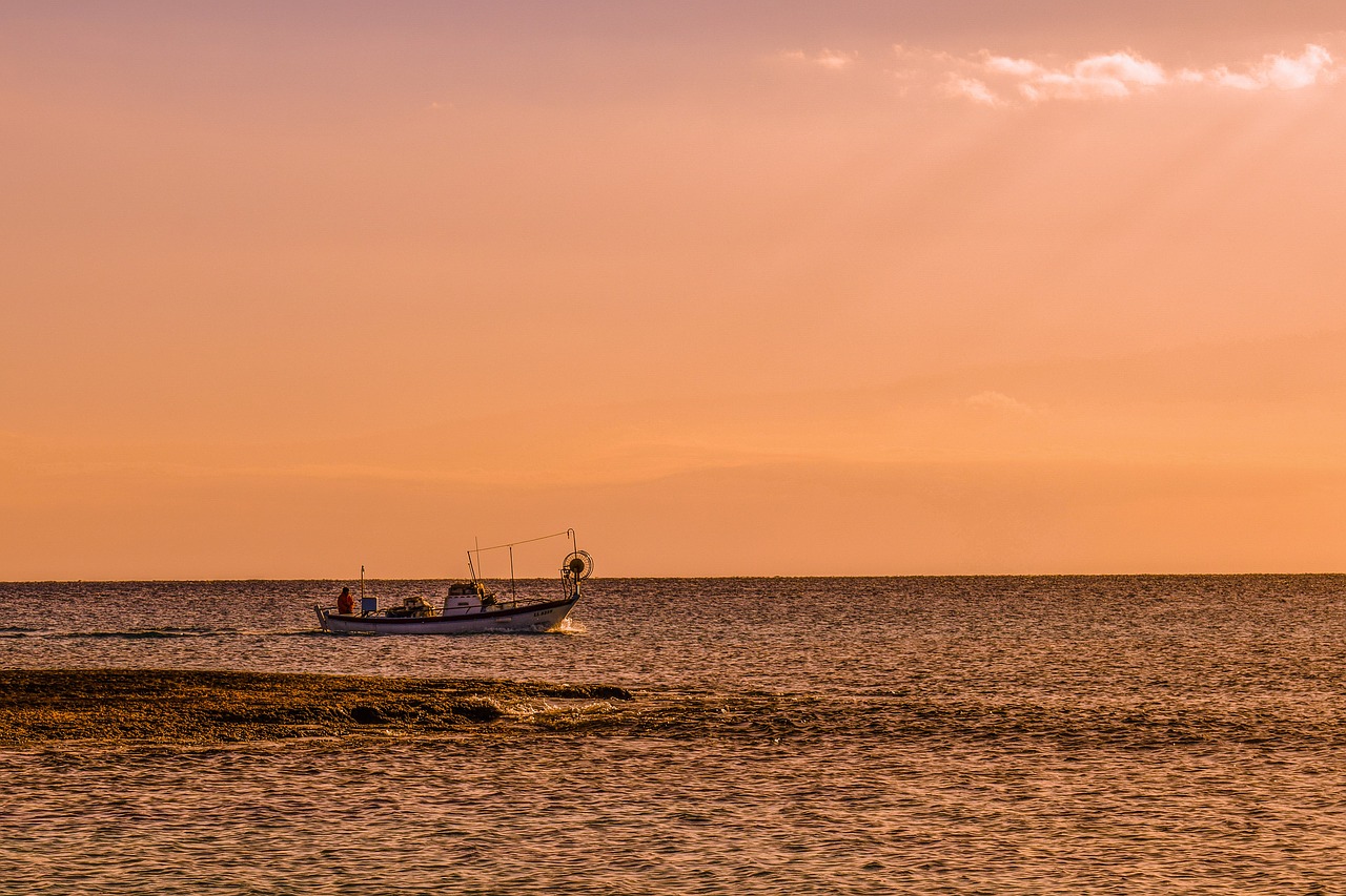 sunset boat sea free photo