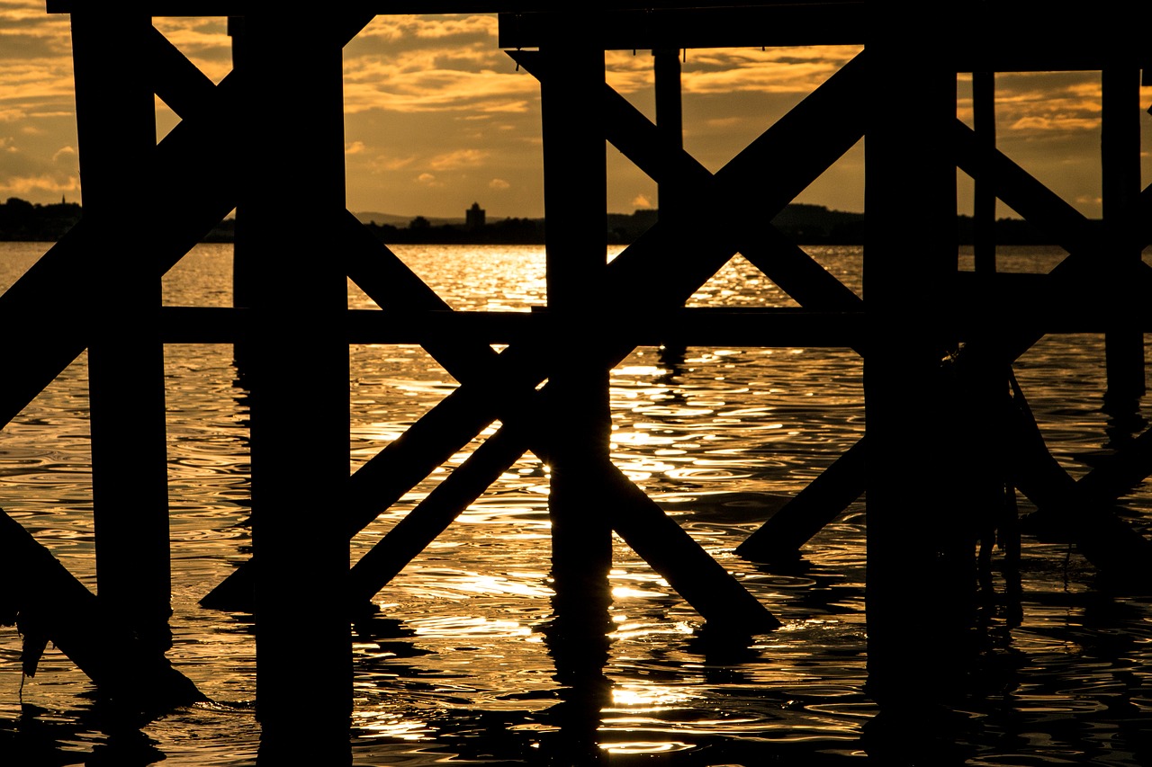sunset silhouette pier free photo