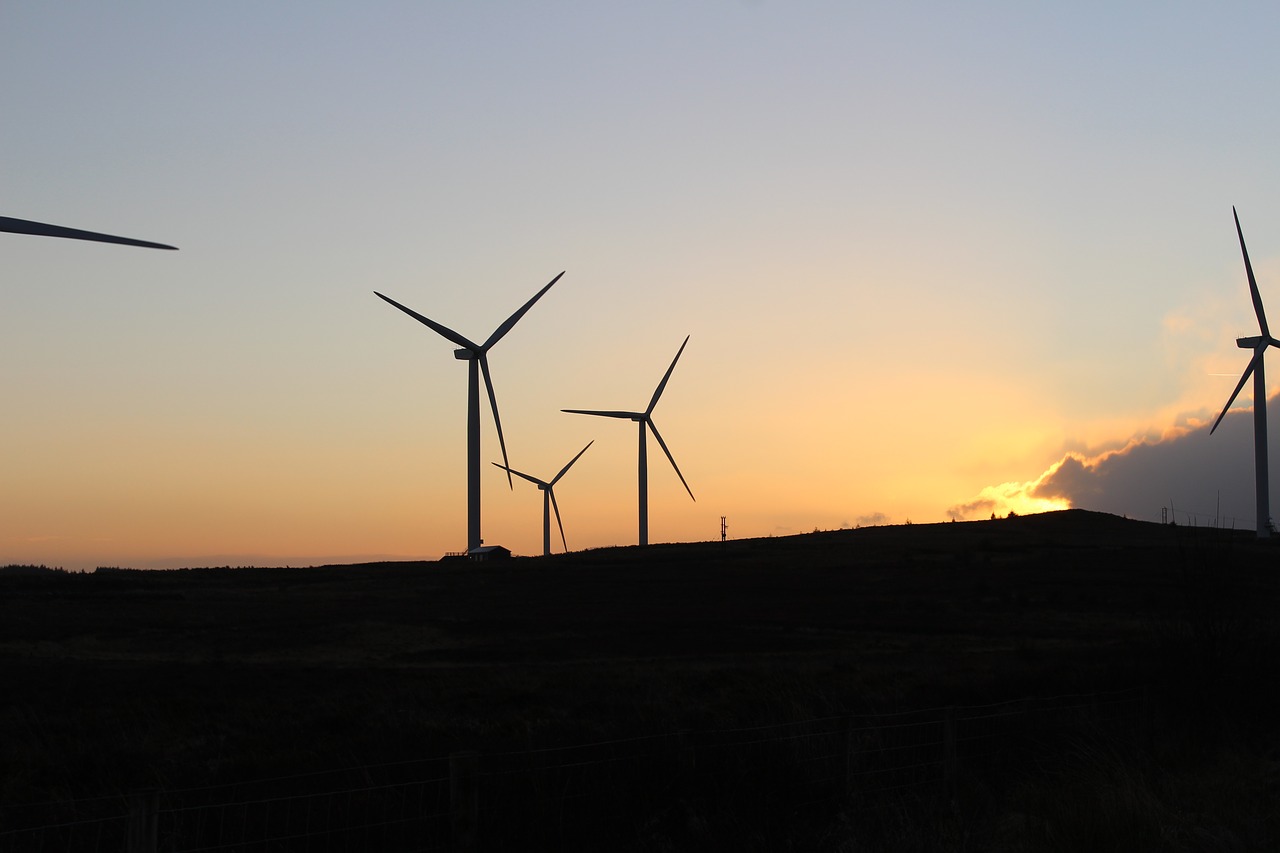 sunset wind turbine free photo
