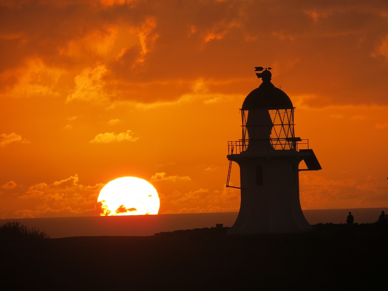 sunset lighthouse evening free photo