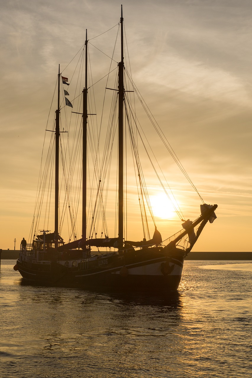 sunset sailboat yellow free photo