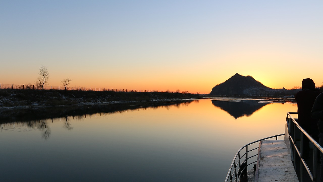 sunset yalu river north korea free photo