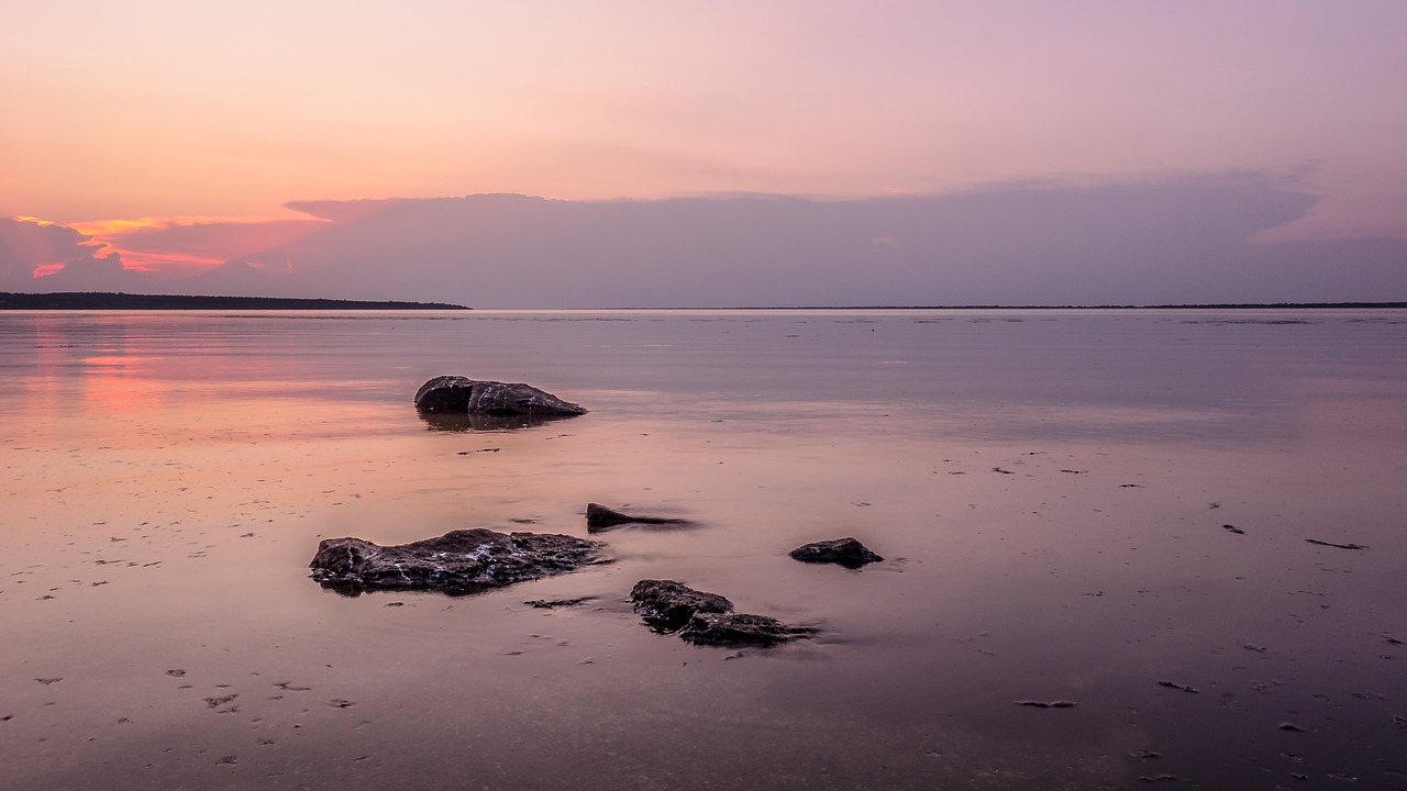 sunset stones clouds free photo