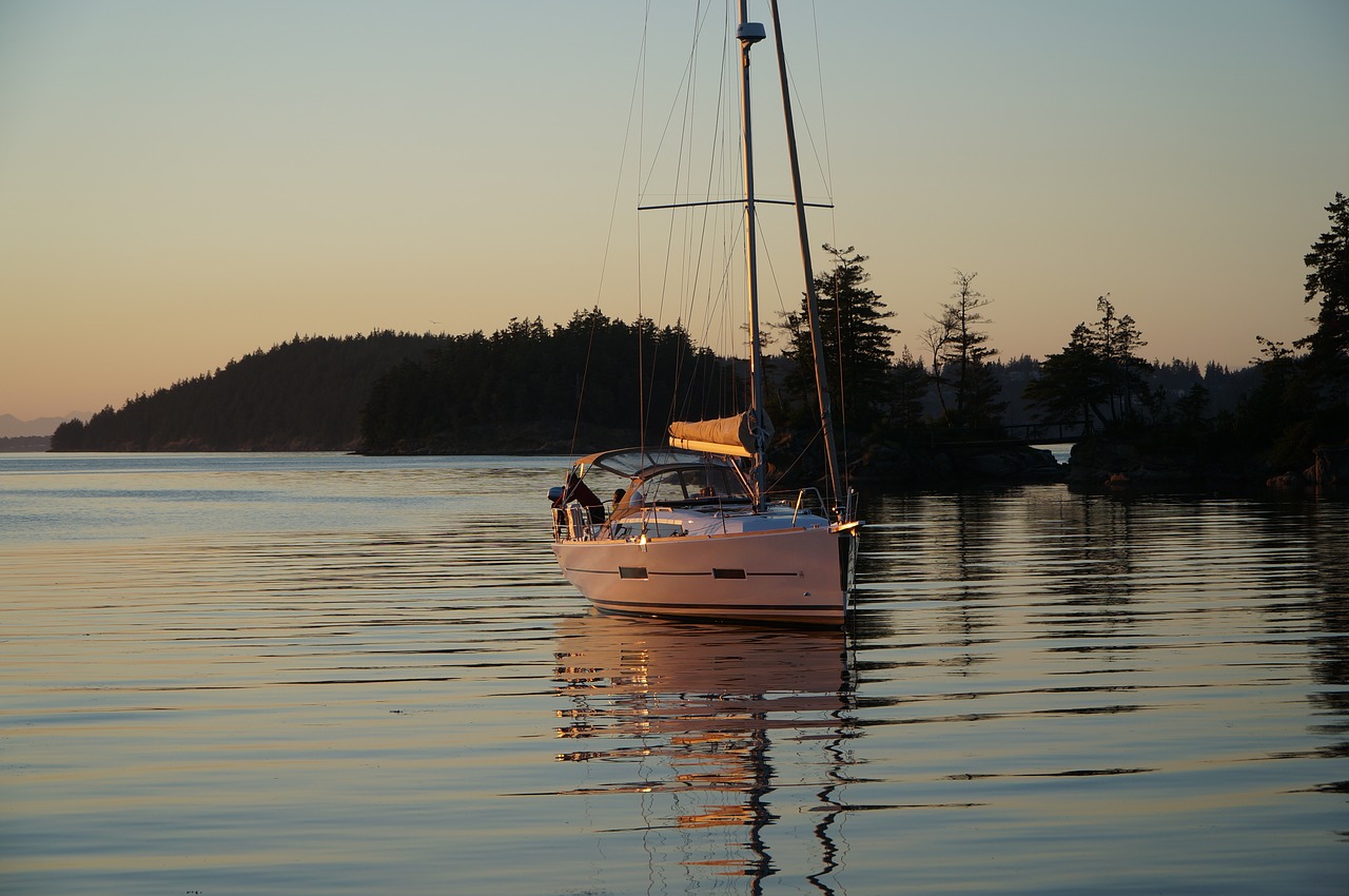 sunset boat ocean free photo