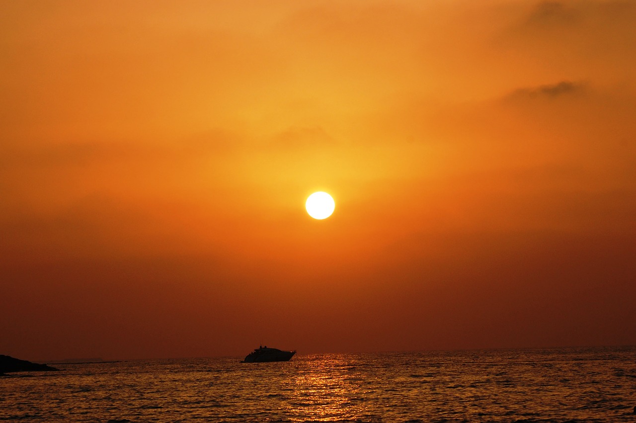 sunset ocean boat free photo