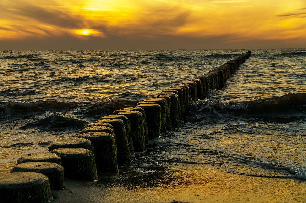 sunset groynes sky free photo