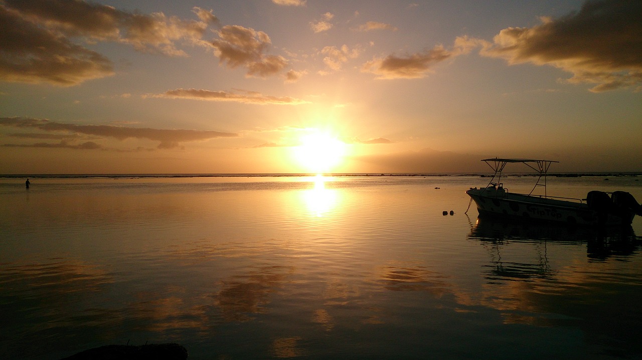 sunset boat ocean free photo