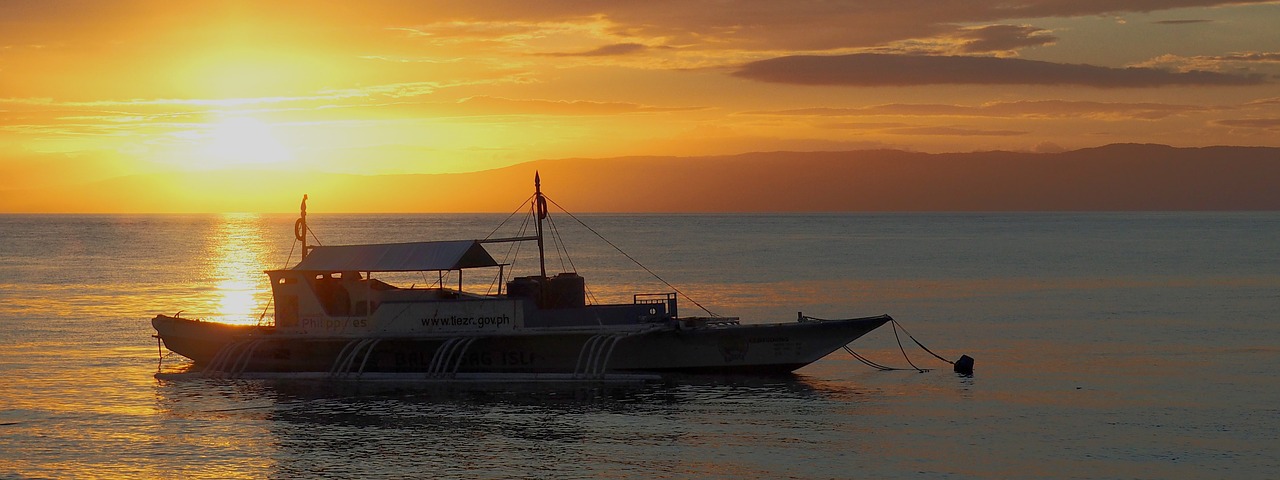 sunset boat outrigger free photo
