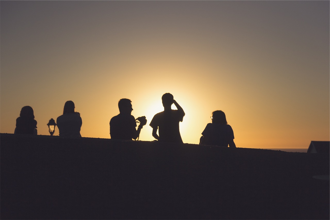 sunset silhouette people free photo