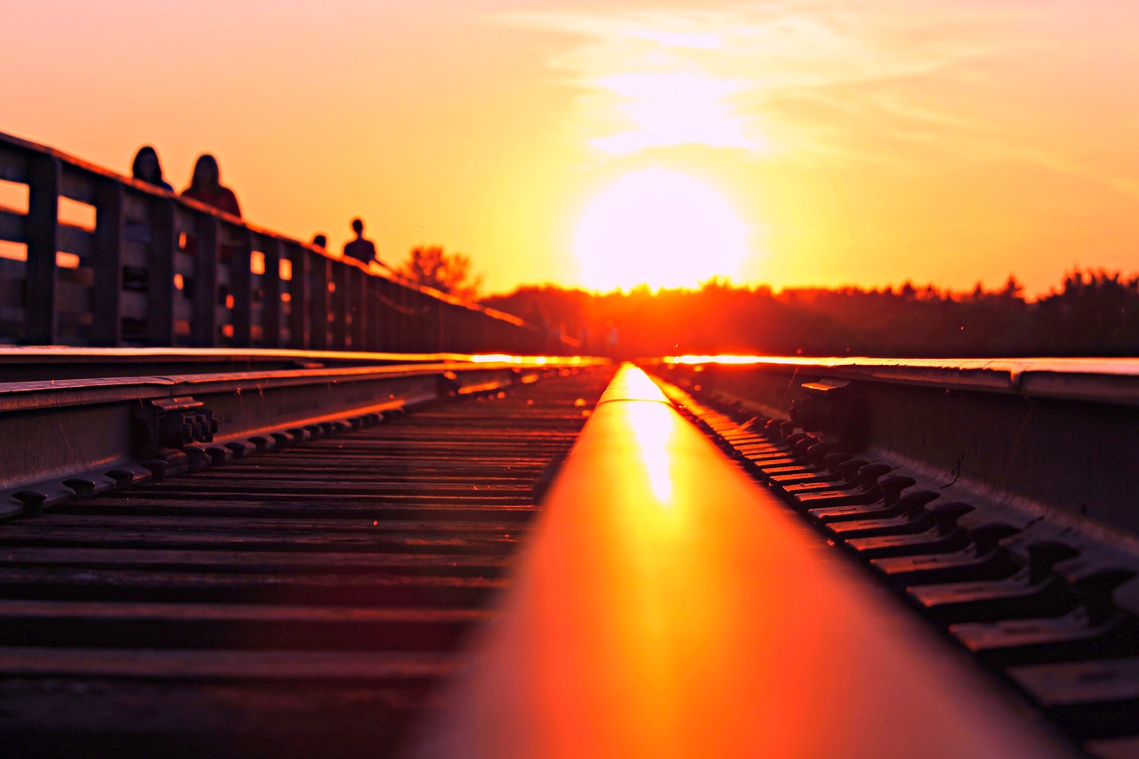 sunset train line bridge free photo