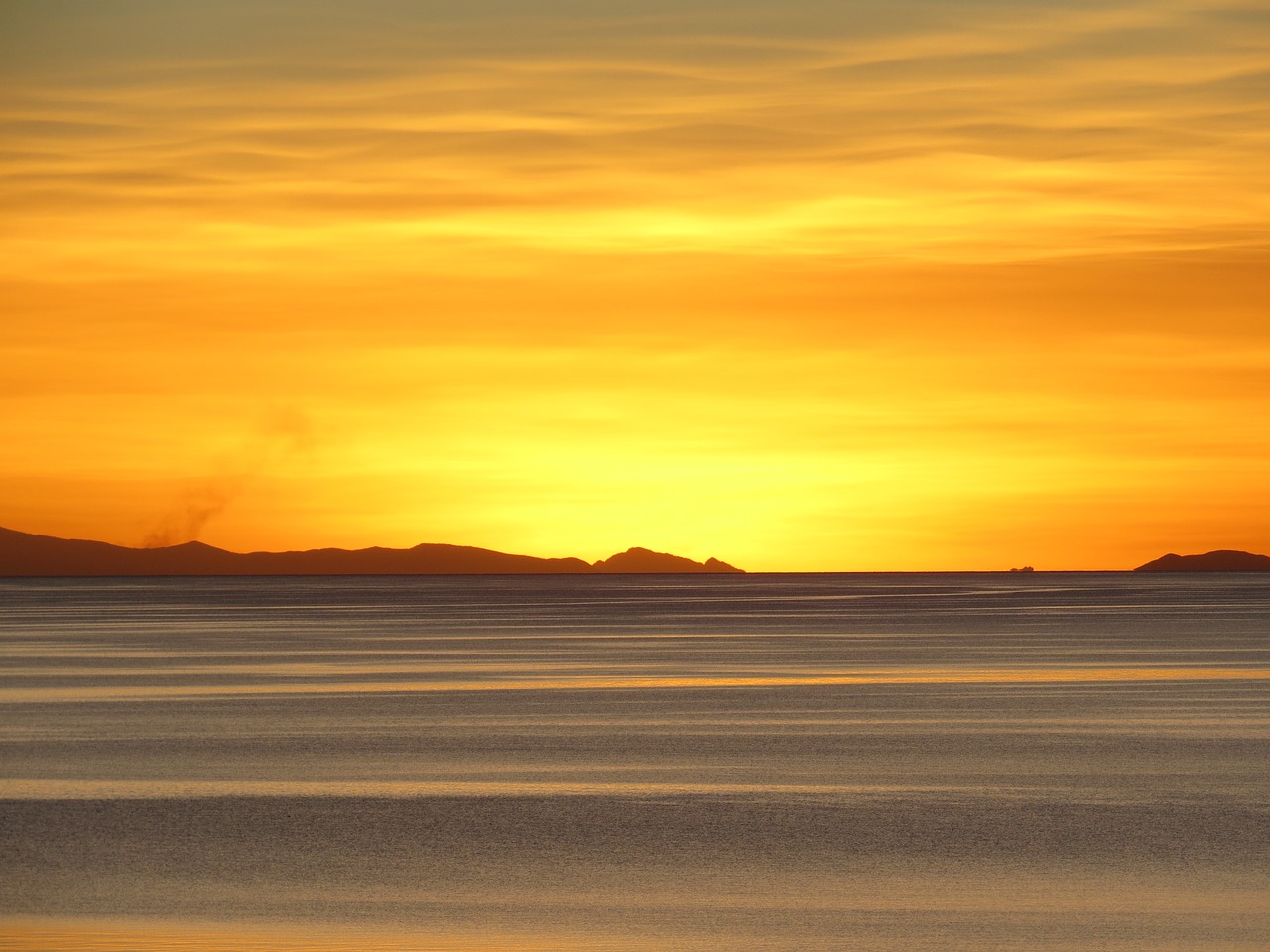 sunset lake titicaca peru free photo