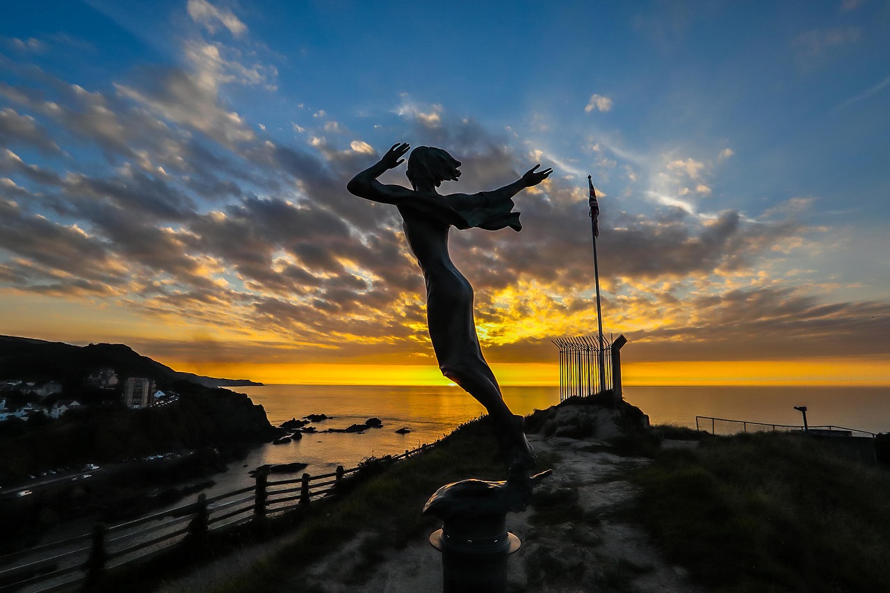 sunset silhouette the statue of free photo