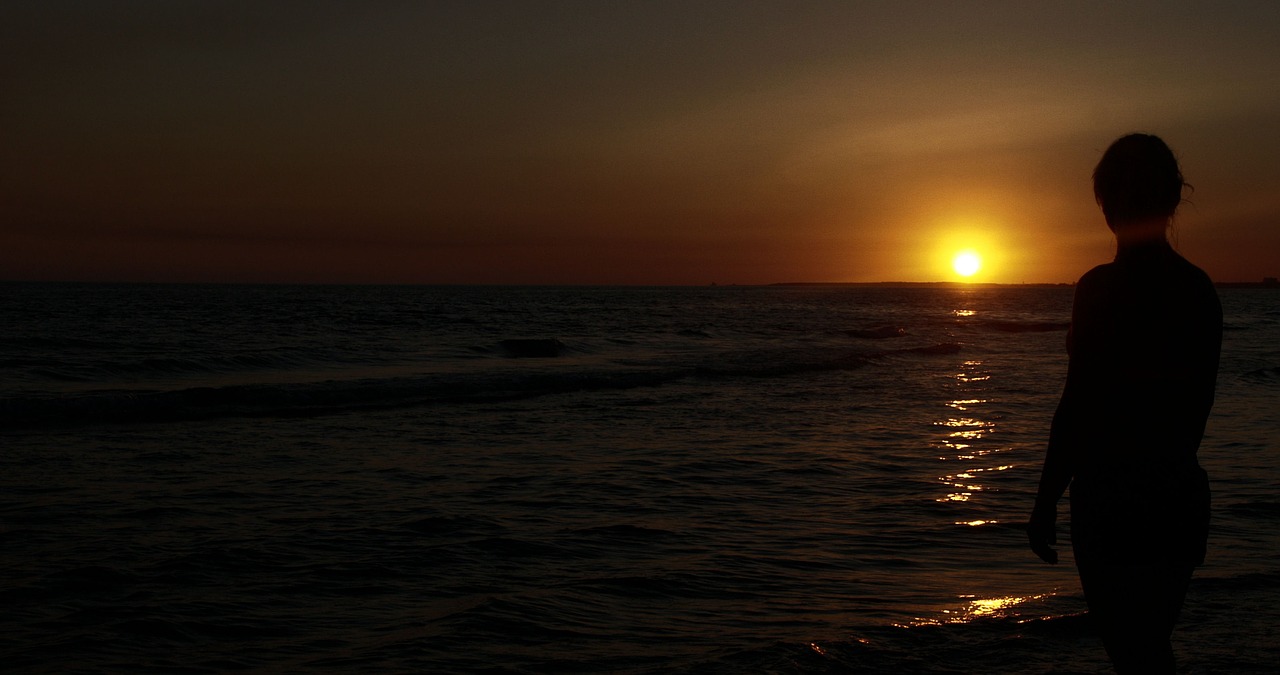 sunset sea woman free photo