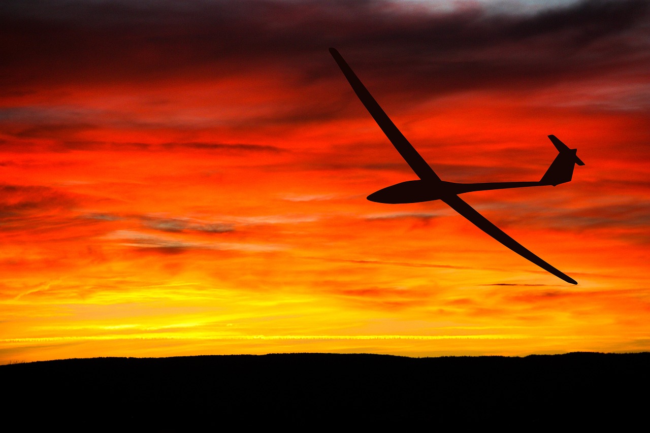 sunset glider silhouette free photo