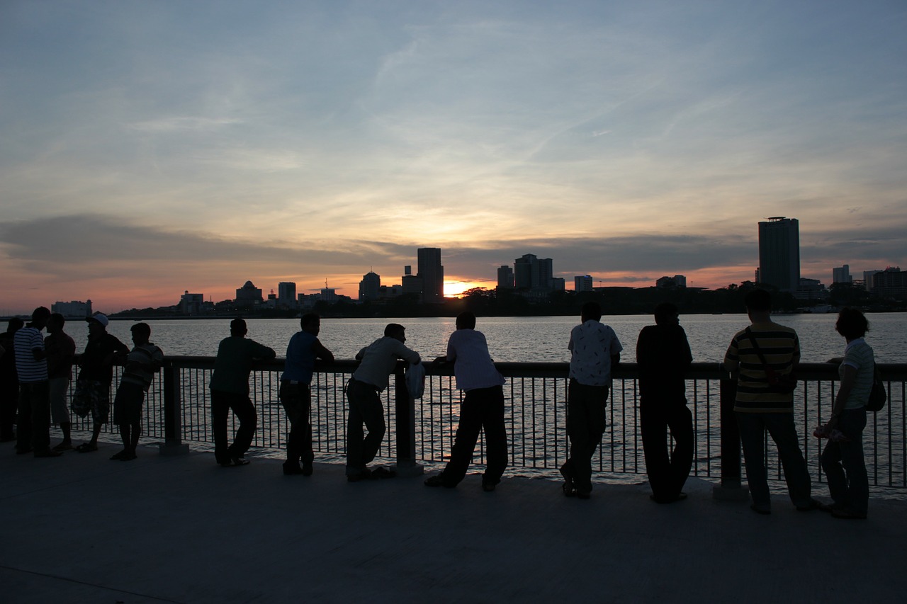 sunset men silhouettes free photo