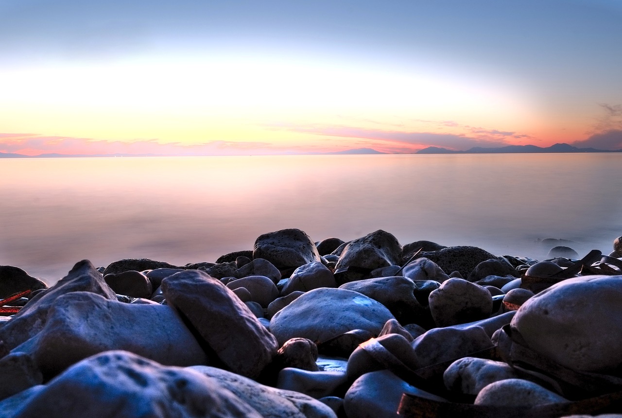 sunset rocks sea free photo