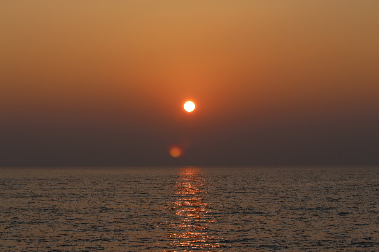 sunset sunrise sun on the sea free photo
