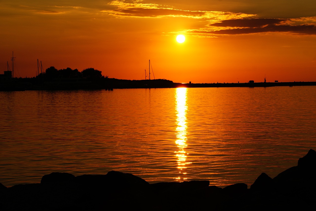 sunset baltic sea warnemünde free photo